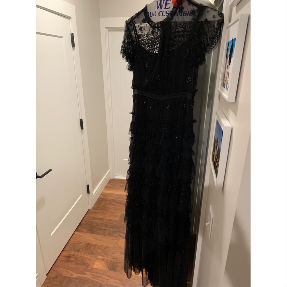 Black needle and thread dress